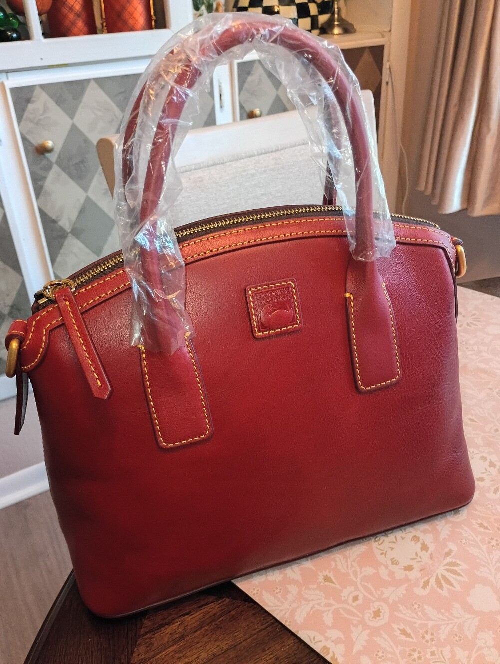 Dooney domed Florentine satchel in Bordeaux